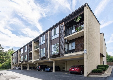 a building with cars parked in front of it